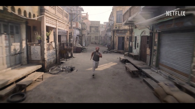 Video Reference: Building, Sky, Road surface, Mode of transport, Flash photography, Asphalt, Alley, Road, Flooring, City