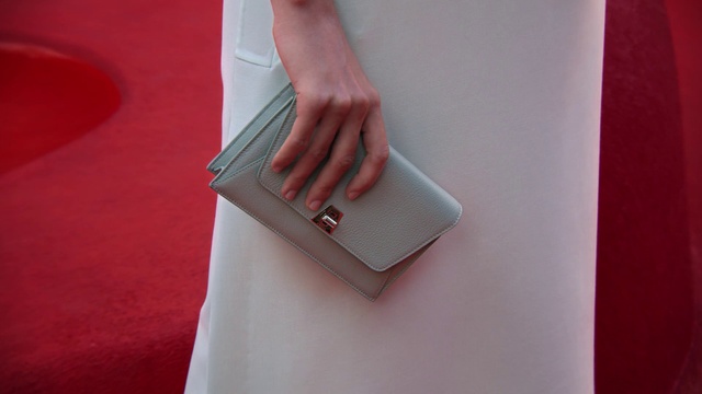 Video Reference: Arm, Dress, Gesture, Waist, Pink, Wood, Gadget, Blazer, Nail, Wrist