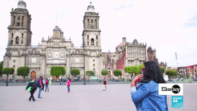 Video Reference: Sky, Cloud, Travel, Building, Leisure, Tree, Facade, Metropolitan area, City, Recreation