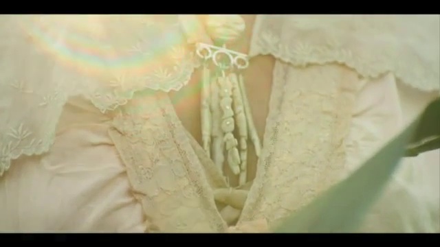 Video Reference: Dress, Neck, Sleeve, Waist, Embellishment, Bridal clothing, Gown, Bridal accessory, Jewellery, Fashion design
