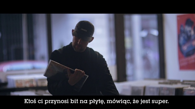 Video Reference: Hand, Sleeve, Flash photography, Cap, Hat, Headgear, Baseball cap, Fedora, Movie, Font