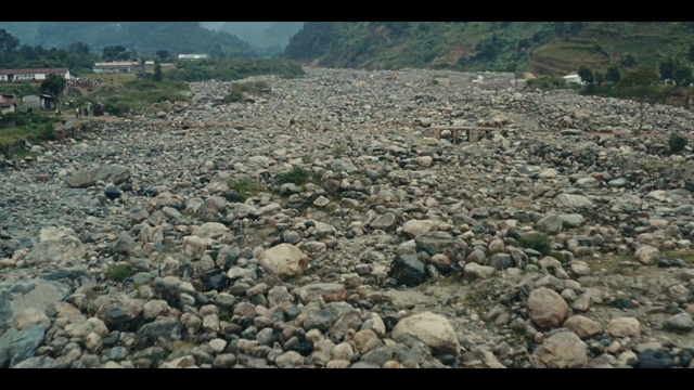 Video Reference: Bedrock, Natural landscape, Landscape, Soil, Rock, Road surface, Rubble, Grass, Cobblestone, Gravel
