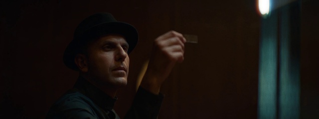 Video Reference: Hand, Cap, Flash photography, Gesture, Baseball cap, Audio equipment, Hat, T-shirt, Elbow, Midnight