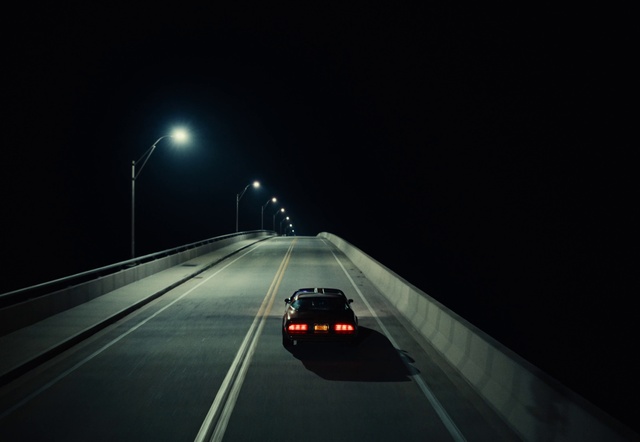 Video Reference: Automotive lighting, Street light, Car, Vehicle, Sky, Road surface, Asphalt, Mode of transport, Headlamp, Thoroughfare