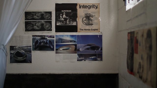 Video Reference: wall, posters, design, concept art, vehicle, futuristic, engine, motorcycle, automotive, architecture, indoor, print, collage, illustration, studio, paper