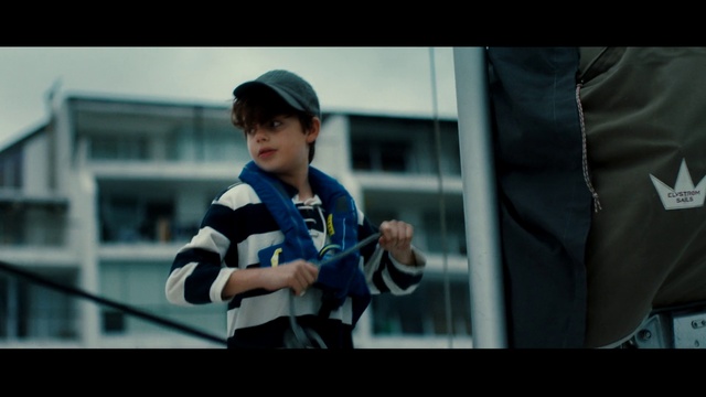 Video Reference: Arm, Flash photography, Sleeve, Cap, Gesture, Street fashion, Baseball cap, Electric blue, Toddler, Elbow