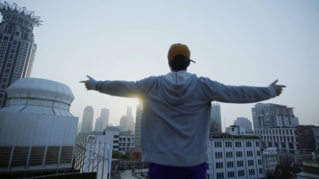 Video Reference: Sky, Building, Arm, World, Gesture, Travel, Tower block, City, People, Monument