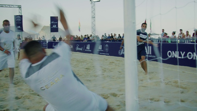 Video Reference: Sports equipment, Shorts, Sky, Fun, Recreation, Sports, Competition event, Event, T-shirt, Beach volleyball