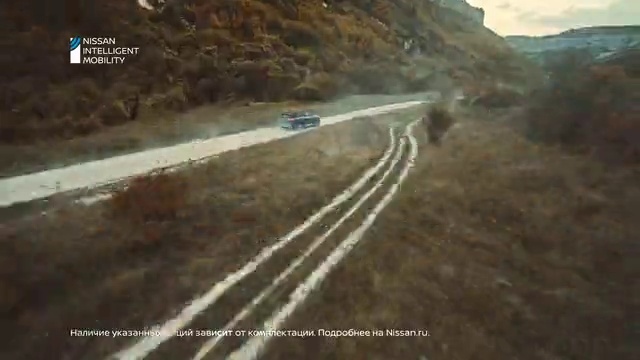 Video Reference: Asphalt, Vehicle, Road surface, Slope, Mountain, Road, Landscape, Tire, Grass, Track