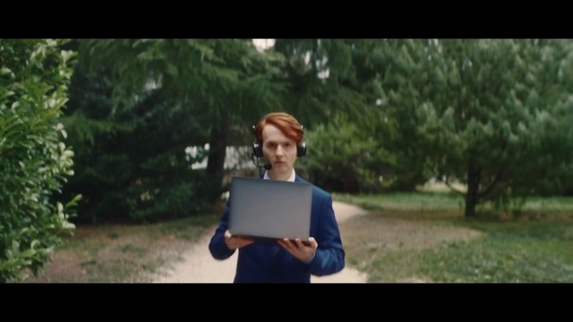 Video Reference: Plant, Computer, Tree, Flash photography, Communication Device, Gesture, Grass, Laptop, Happy, Leisure