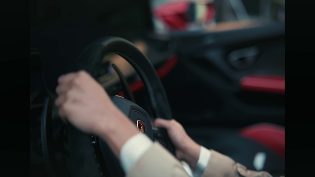 Video Reference: Hand, Vehicle, Wheel, Automotive lighting, Motor vehicle, Automotive mirror, Car, Steering wheel, Automotive design, Automotive tire