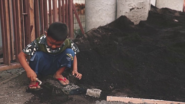 Video Reference: Automotive tire, Asphalt, Road surface, Automotive wheel system, Hat, Flooring, Concrete, Tree, Personal protective equipment, Soil