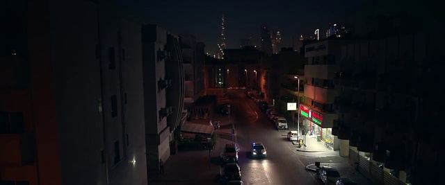 Video Reference: Car, Window, Building, Automotive lighting, Vehicle, Electricity, Road surface, Dusk, Midnight, Street light