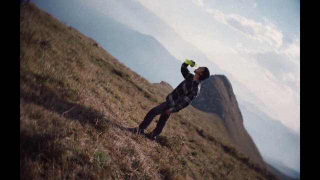 Video Reference: Cloud, Sky, Mountain, Ecoregion, Highland, Plant, Slope, Outdoor recreation, Terrain, Mountainous landforms
