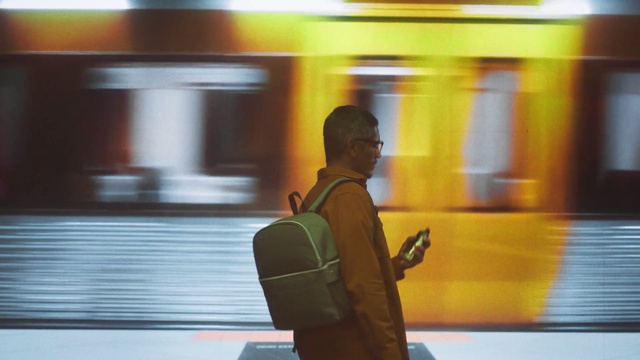 Video Reference: Orange, Travel, Luggage and bags, Bag, Passenger, Public transport, Backpack, City, Baggage, Sitting