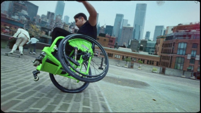 Video Reference: Wheel, Building, Bicycle tire, Sky, Tire, Rolling, Eyewear, Street stunts, Cycling, Spoke