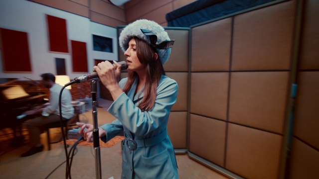 Video Reference: Microphone, Public address system, Musician, Music, Cap, Audio equipment, Entertainment, Fun, Street fashion, Event