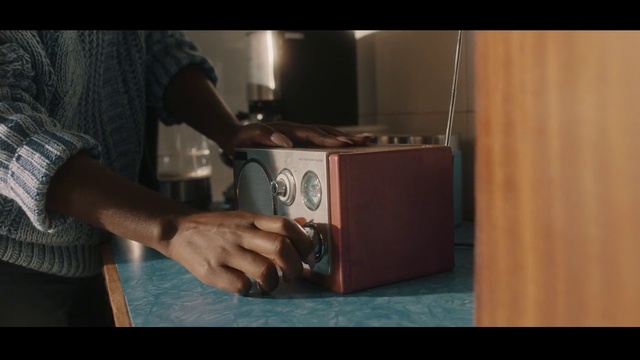 Video Reference: Hand, Wood, Flash photography, Audio equipment, Gadget, Wrist, Hardwood, Event, Entertainment, Drink