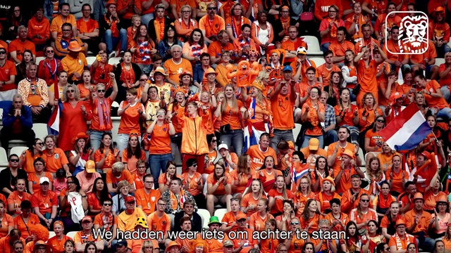 Video Reference: Sports jersey, Orange, Jersey, Sleeve, Fan, Crowd, T-shirt, Red, Championship, Font