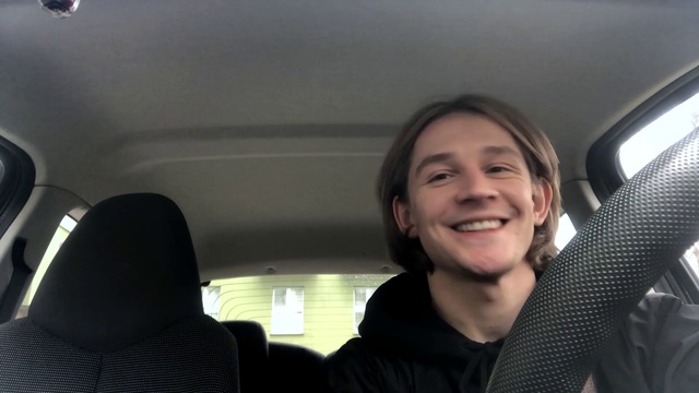 Video Reference: Smile, Window, Vehicle, Mouth, Car, Head restraint, Automotive design, Gesture, Seat belt, Car seat
