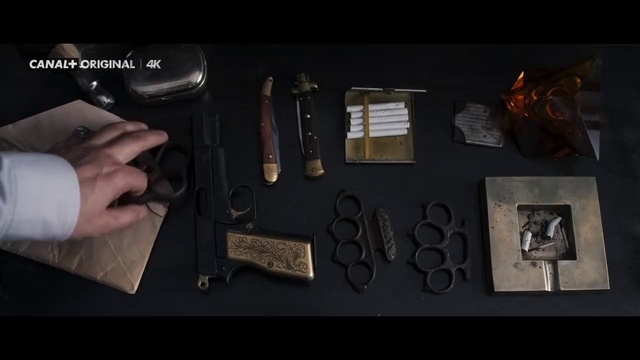 Video Reference: Car alarm, Revolver, Gesture, Eyewear, Everyday carry, Gadget, Font, Sunglasses, Fashion accessory, Tool