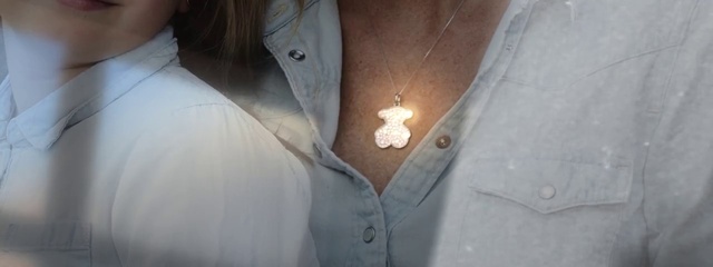 Video Reference: Outerwear, Dress shirt, Neck, Dress, Sleeve, Sunglasses, Flash photography, Grey, Collar, Waist