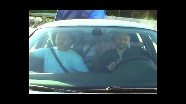 Video Reference: Car, Smile, Vehicle, Motor vehicle, Automotive mirror, Automotive design, Window, Gesture, Vehicle door, Mode of transport