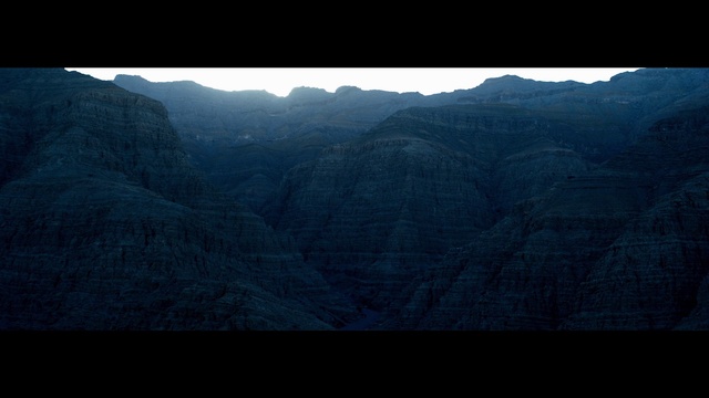 Video Reference: Mountain, Sky, Natural landscape, Terrain, Atmospheric phenomenon, Rectangle, Formation, Valley, Landscape, Slope