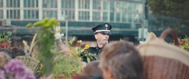 Video Reference: Peaked cap, Plant, Military uniform, Cap, Military person, Gesture, Flower, Building, Beret, Non-commissioned officer