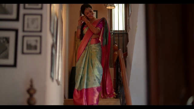 Video Reference: Face, Sari, Waist, Silk, Fashion design, Trunk, Formal wear, Magenta, Event, Abdomen
