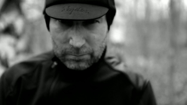 Video Reference: Forehead, Chin, Outerwear, Eyebrow, Eye, White, Cap, Beard, Flash photography, Sleeve