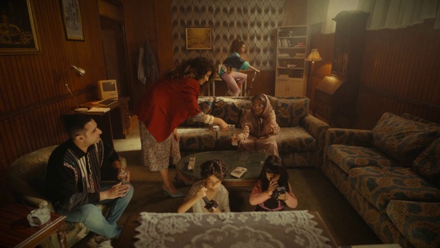 Video Reference: Couch, Comfort, Interior design, Living room, Picture frame, Wood, Event, Fun, Coffee table, Flooring