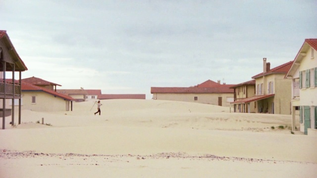 Video Reference: Sky, Cloud, Body of water, Building, Landscape, Tints and shades, Beach, Horizon, House, Window