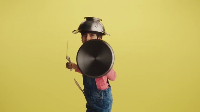 Video Reference: Helmet, Sleeve, Gesture, Elbow, Headgear, Audio equipment, Personal protective equipment, Flash photography, Fashion accessory, Eyewear