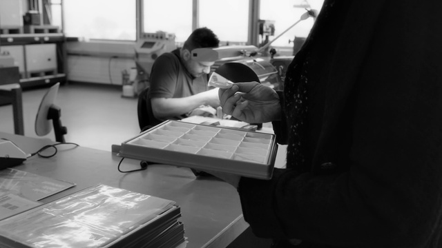 Video Reference: Style, Black-and-white, Office equipment, Automotive design, White-collar worker, Engineering, Table, Typing, Eyewear, Monochrome