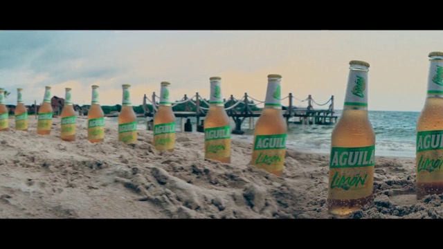 Video Reference: Sky, Liquid, Bottle, Drinkware, Fluid, Drink, Water, Travel, Sand, Horizon