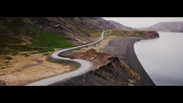 Video Reference: Water, Asphalt, Road surface, Natural landscape, Highland, Slope, Mountain, Landscape, Road, Tar
