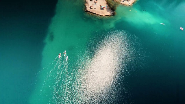 Video Reference: Water, Azure, Liquid, Aqua, Electric blue, Lake, Event, Landscape, Wind wave, Fashion accessory