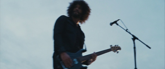 Video Reference: Musical instrument, Microphone, Arm, Guitar, Public address system, Guitar accessory, Musician, Concert, String instrument accessory, Musical instrument accessory