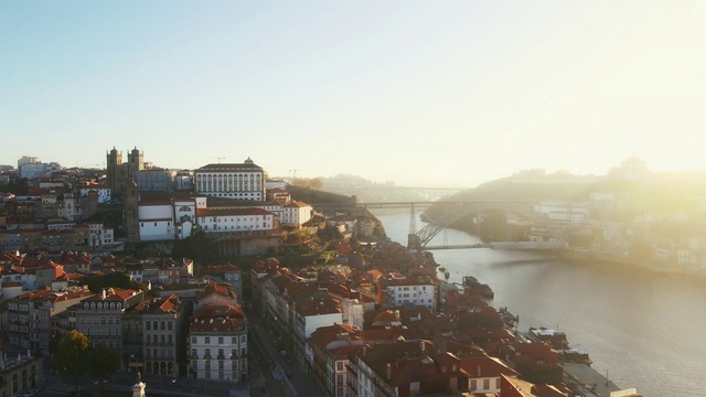 Video Reference: Sky, Water, Building, Urban design, Landscape, Horizon, City, Hill, Travel, Fog
