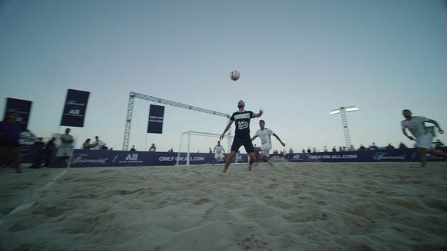 Video Reference: Sky, Sports equipment, Active shorts, Net sports, Volleyball player, Volleyball, Ball, Volleyball, Volleyball net, Beach