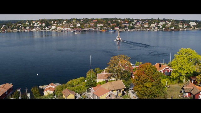 Video Reference: Water, Water resources, Daytime, Plant, Azure, Building, Lake, Urban design, Body of water, Tree