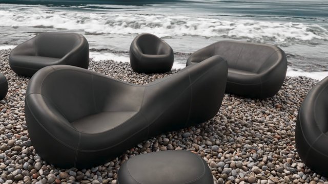 Video Reference: beach, ocean, waves, pebbles, chairs, lounge chairs, outdoor seating, modern furniture, shoreline, seaside, relaxation, minimalist, black furniture, coastal