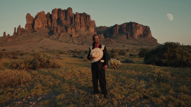Video Reference: Sky, Plant, Mountain, Nature, Natural landscape, Landscape, Mountainous landforms, Grassland, People in nature, Sun hat