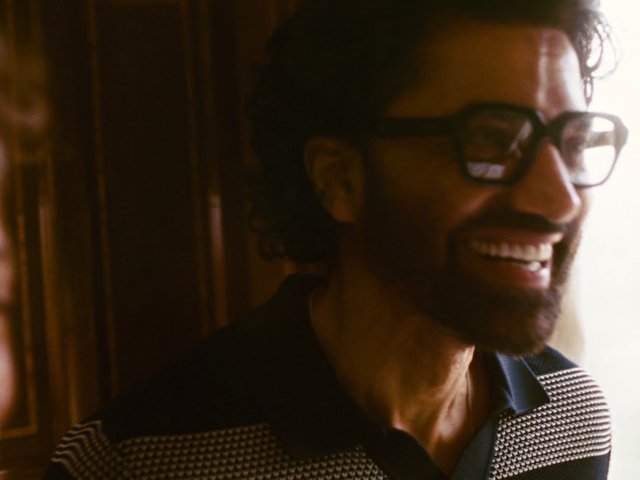 Video Reference: man, glasses, smiling, close-up, indoor, window light, warm light, portrait, casual, beard, profile, interior