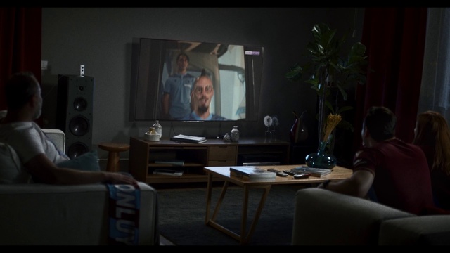 Video Reference: Furniture, Table, Interior design, Plant, Television set, Living room, Comfort, Coffee table, Event, Houseplant