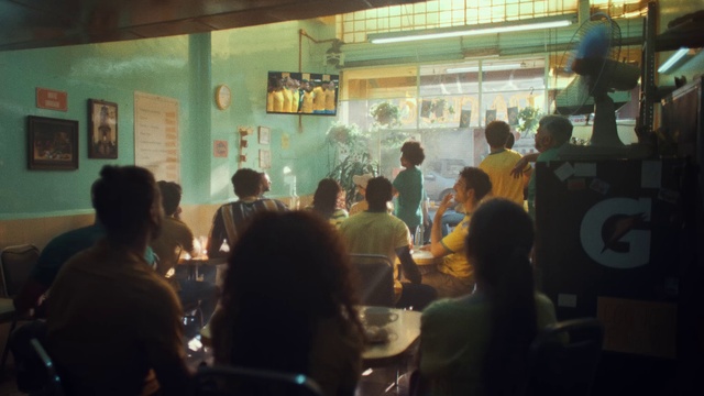 Video Reference: Picture frame, T-shirt, Crowd, Event, Leisure, Fun, Chair, Tableware, Room, Customer