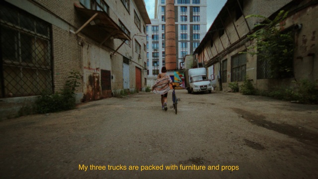 Video Reference: Tire, Building, Wheel, Window, Plant, Car, Vehicle, Road surface, Asphalt, Neighbourhood