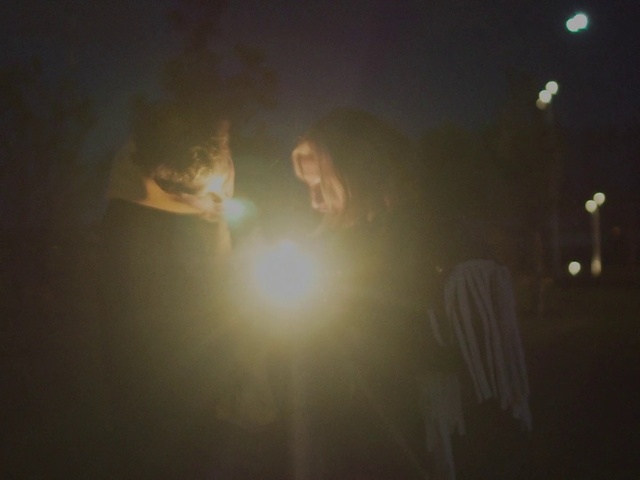 Video Reference: Hand, Atmosphere, Cloud, Flash photography, Automotive lighting, Gesture, Atmospheric phenomenon, Sky, Astronomical object, Tree