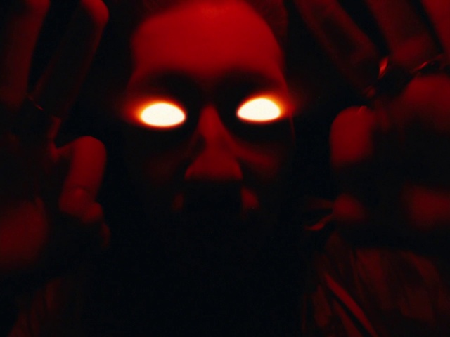 Video Reference: Orange, Gesture, Eyewear, Headgear, Eyelash, Heat, Fictional character, Darkness, Magenta, Event